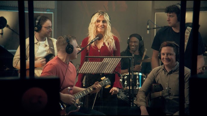 Pixie Lott recording I'm Gonna Be (79 Miles) with a band in a studio